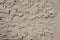 Old traditional whitewashed stone wall texture