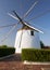 Old traditional windmill on the hill near El Granado in Andalusia, Spain