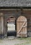 Old traditional wooden doors to family house with straw roof in the Polish countryside