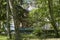 Old and traditional wooden house in forest.