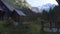 Old traditional wooden huts on a meadow at austrian Alps