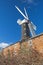 Old traditional working windmill in rural setting