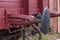 Old train carriage on rails, Red wooden train carriage. Old style hook railway coupling