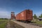 Old train cars and a grain elevator in Big Valley