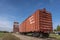 Old train cars and a grain elevator in Big Valley