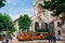 Old tram in Soller in front of medieval gothic cathedral with huge rose window, Mallorca, Spain