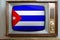 Old tube vintage TV with the national flag Cuba on the screen, stylish 60s interior, the concept of eternal values â€‹â€‹on