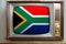 Old tube vintage TV with the national flag of South Africa on screen, stylish interior of 60s, the concept of eternal values