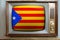 Old tube vintage TV with the national flag of Spain, catalonia on screen, stylish interior of 60s, the concept of eternal values