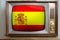 Old tube vintage TV with the national flag of Spain on the screen, stylish interior of the 60s, the concept of eternal values