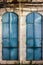 Old turquois With closed shutters window and openwork a beautiful vintage background