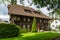 Old two-story wooden dwelling house with an attic and a tiled roof in Lucerne, Switzerland