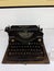 Old typewriter in antique vintage 19th and 20th century - mechanical typewriter.
