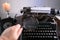Old typewriter on table, words true story are printed on paper in large size, retro style, magnifying glass, concept of writer,
