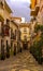 Old typical Andalucian street with flowers.