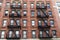 Old typical apartment buildings in Harlem, New York City, USA