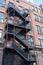 Old typical brick house in Chinatown, New York City, USA