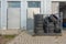 Old tyres pile up in front of a garage to be disposed of