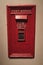 Old UK Post Box embedded in wall