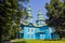 Old Ukrainian church  open-air museum near Pereiaslav-Khmelnytskyi  Ukraine. Old wooden church painted with blue paint
