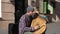 Old ukrainian ethnic musical instrument bandura pandora close up. The guy plays outside