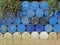 Old, unused oil tanks are placed in an orderly manner