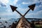 Old unused rusty anchor on the sea shore