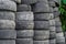 Old used car tires stacked in stacks