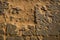 Old used concrete pavement and sand background