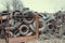 Old used damaged car tires at the dump