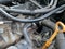 Old used diesel engine with rusty and dirty auto parts, water infiltration and bad car maintenance