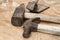 Old used hammers and adze