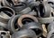 Old used tires piled up background
