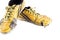 Old used  yellow worn out futsal sports shoes  on white background soccer sportware object isolated