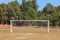 Old vacant football soccer goal gate in rural grass field in Chiang Mai,Thailand