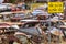 Old vehicles left in nature at the end of the road in a Ivan`s deserted car cemetery in Sweden