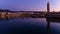 Old venetian harbor with lighthouse at twilight, city of Rethymno, island of Crete