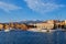 Old Venetian port, Chania, Crete, Greece. Sailboats, yachts, pier, shipyards or Arsenali Veneziani or Neoria. Bell tower