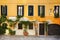 An old Venician house with windows, plants and a door