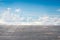 Old vertical striped wooden terrace with sunny sky cloudscape