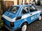 Old very popular Fiat 126p passenger car repainted to resemble a police car. In the years 1944-90 in People`s Poland