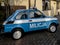 Old very popular Fiat 126p passenger car repainted to resemble a police car. In the years 1944-90 in People`s Poland
