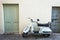 Old Vespa scooter on italian alley