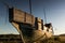 An old vikings boat staying on grass. Russia, Karelia