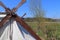 Old vikings tent made of cloth and wood in front of a blue sky