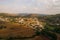 Old village in Cyprus mountains Mosfiloti or Mosfilioti, aerial view. Beautiful old houses in valley