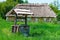 Old village well with a wood roof