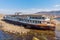 Old vintage abandoned rusted ship run aground after shipwreck accident in beginning of XX century in Crimean coast