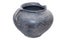 Old vintage ancient broken scratched ceramic dark vase or pot on white