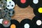 Old vintage bobbins and vinyl records on a wood table background. Multicolored labels. Top view. Place to copy space